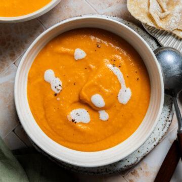 A bowl of gluten-free carrot bean soup.